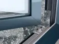 Mechanizm regulacji drzwi balkonowych uchylnych, pokazujący precyzyjne dopasowanie elementów.