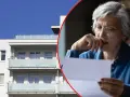 Zmartwiona starsza kobieta czyta list obok nowoczesnego bloku mieszkalnego. Czy to oznacza, że odstąpię mieszkanie TBS?