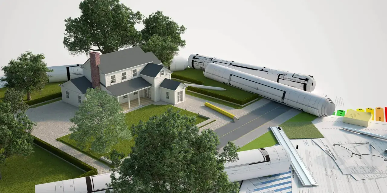 Model domu z planami i materiałami budowlanymi. Część budynku na działce sąsiada, symbolizująca projektowanie i planowanie.