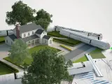Model domu z planami i materiałami budowlanymi. Część budynku na działce sąsiada, symbolizująca projektowanie i planowanie.