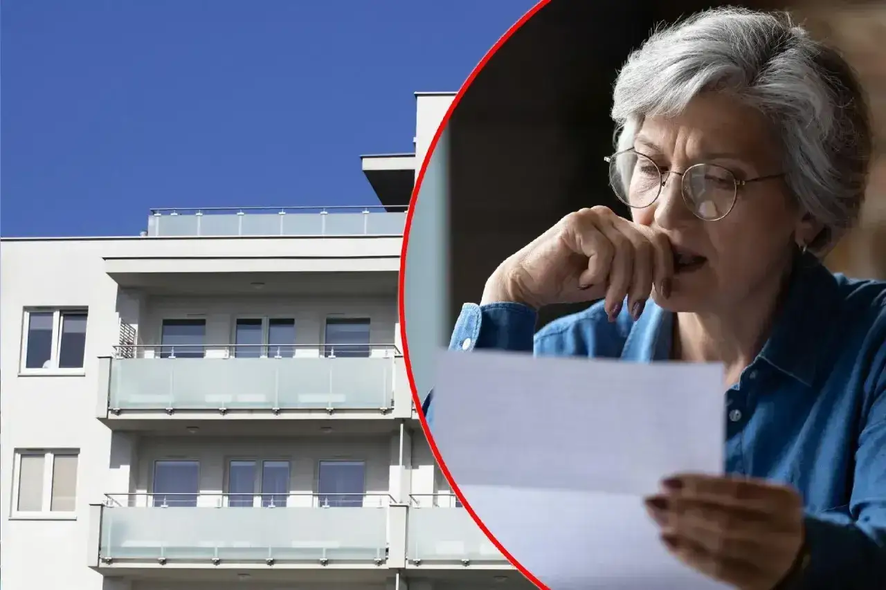 Zmartwiona starsza pani czyta dokument. Obok nowoczesny blok mieszkalny. Czy to oznacza, że odstąpię mieszkanie TBS?